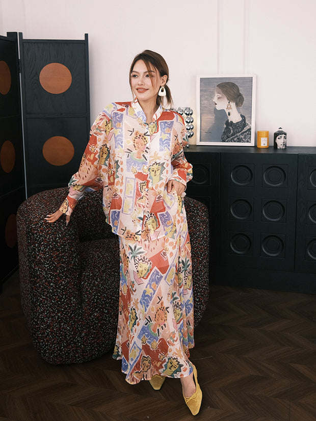 MUKZIN「 カプセルシリーズ 」抽象的な人物プリントのゆるやかなロングスカート